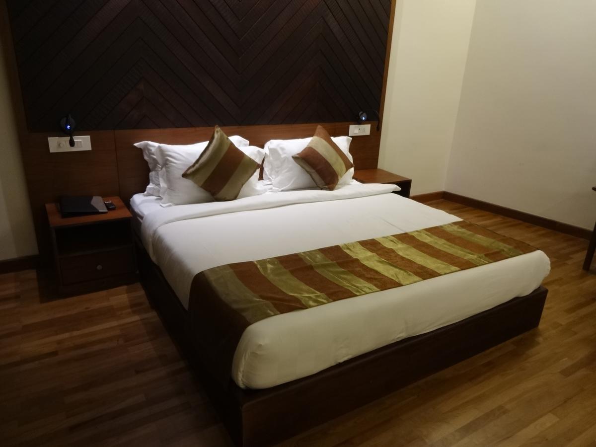 Woodies Bleisure Hotel Kozhikode Ngoại thất bức ảnh