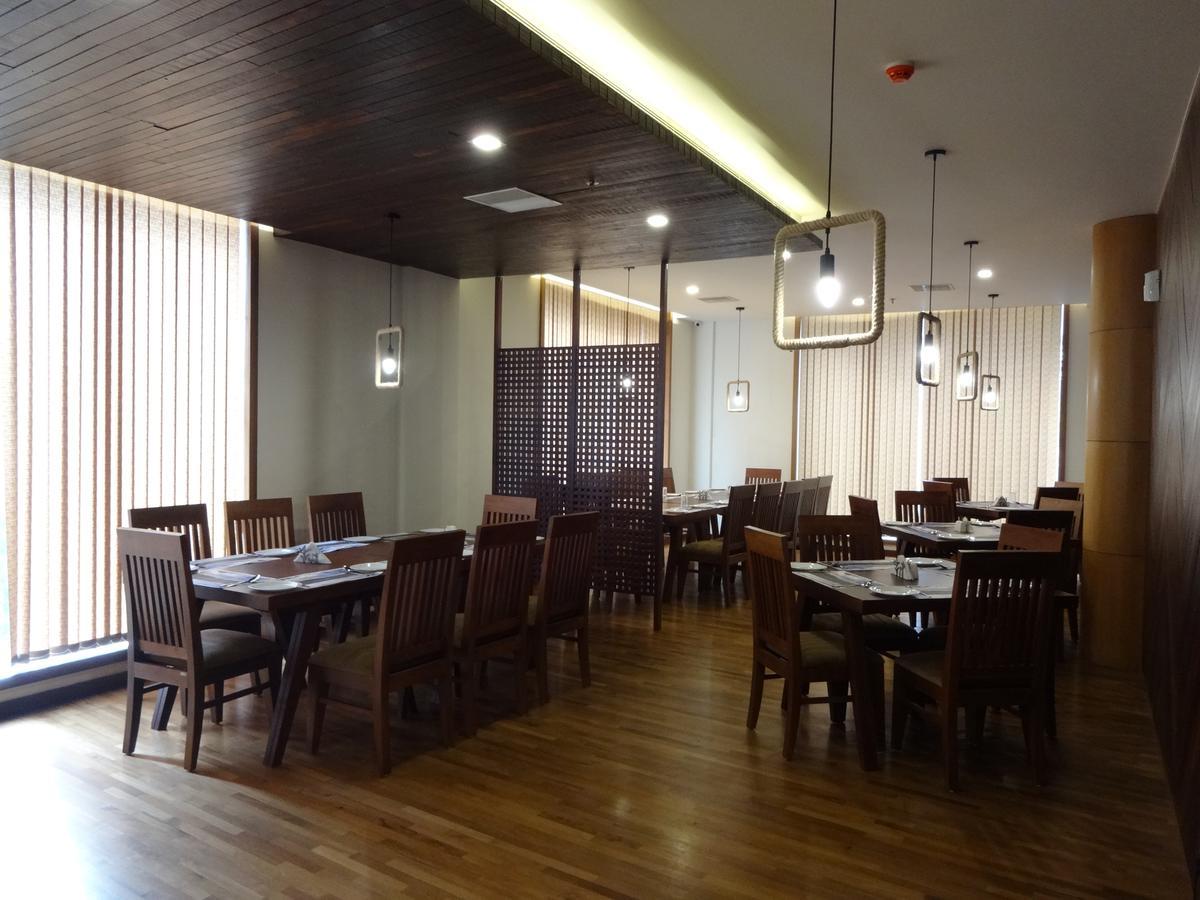Woodies Bleisure Hotel Kozhikode Ngoại thất bức ảnh